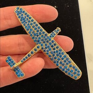 Blue Rhinestone Airplane Brooch
Windy Gell Airplane Brooch